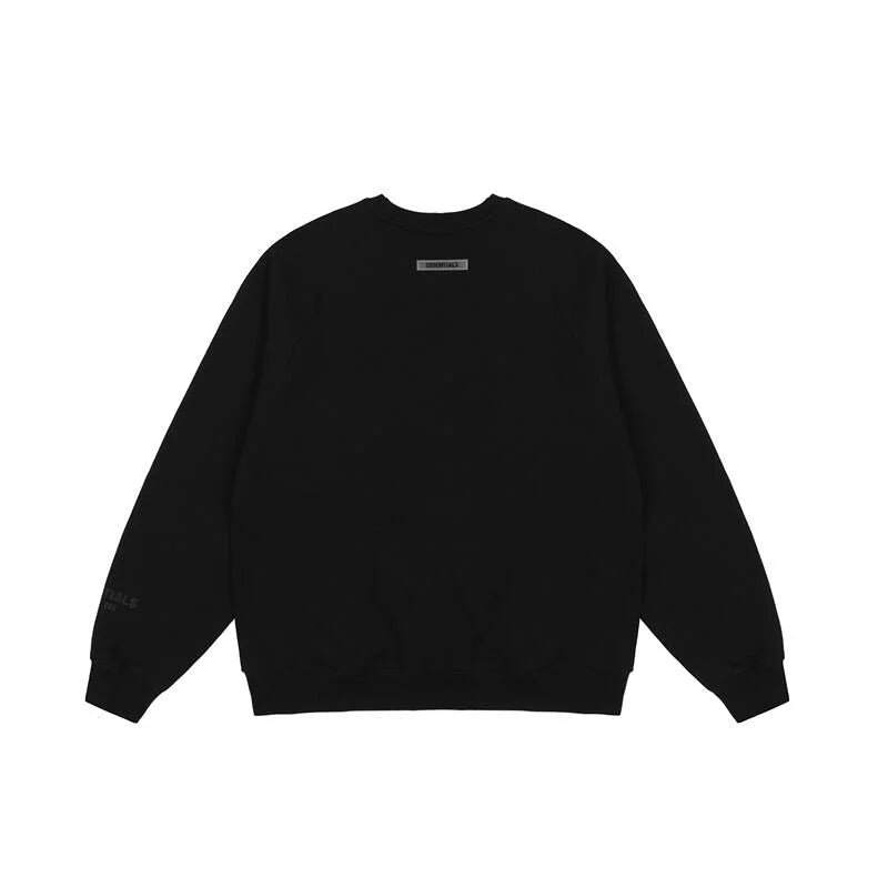 Design details of Essentials black core streetwear fleece tracksuit by Fear Of God


