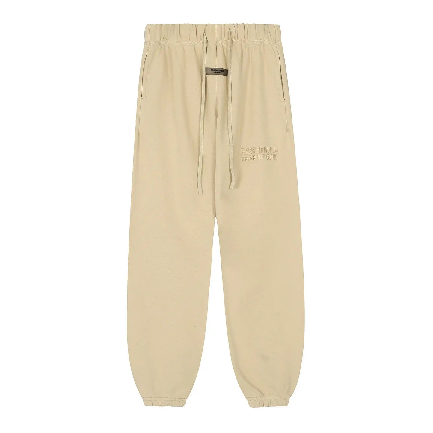 Garden yellow Essentials joggers soft-touch rubberized logo on leg close-up