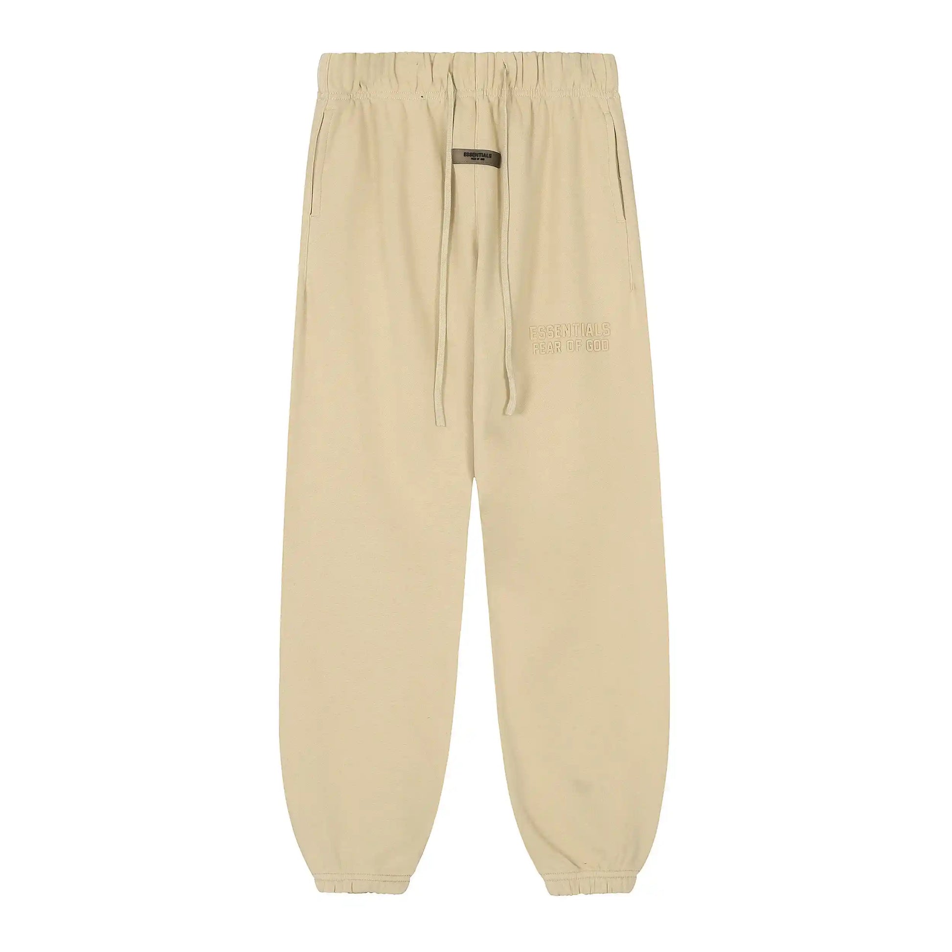 Garden yellow Essentials joggers soft-touch rubberized logo on leg close-up