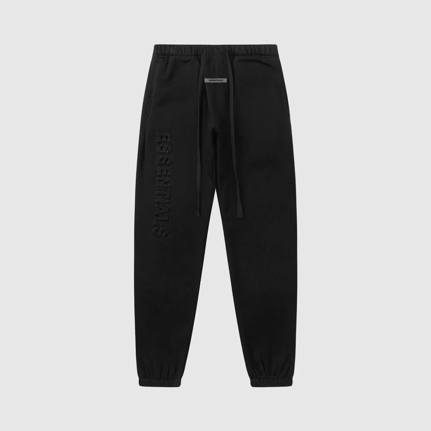 Essentials black modern fleece sweatpants by Fear of God front view