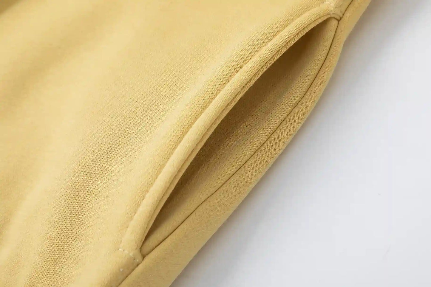 Styled Essentials garden yellow cozy fleece tracksuit for everyday casual wear by Fear Of God