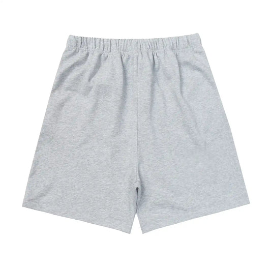 Fear of God Essentials dark heather oatmeal fleece shorts with tonal logo and relaxed silhouette