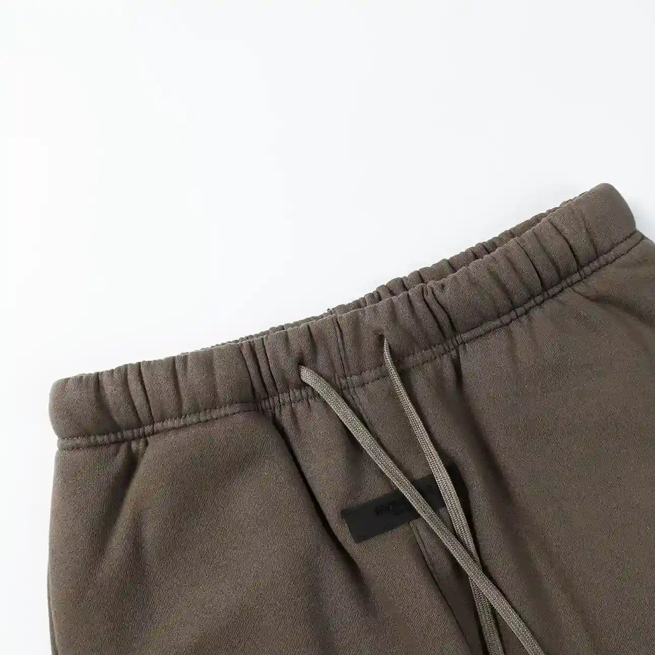 Premium fleece fabric detail on sandstone sweatpants by Fear Of God