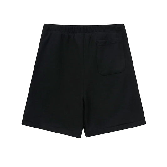 Fear of God Essentials Black fleece shorts relaxed fit side view