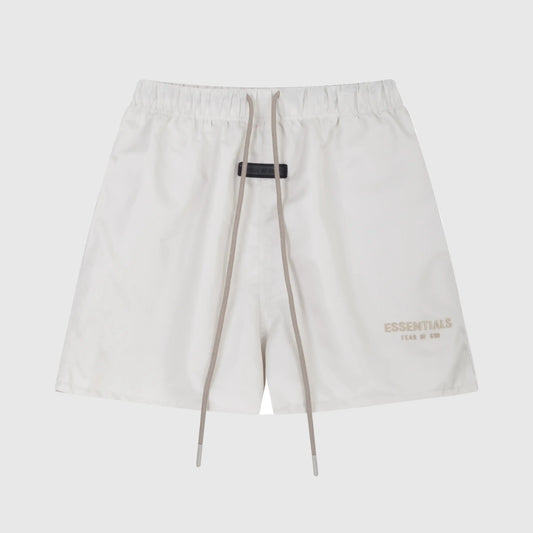 Fear of God Essentials Cloud Dance fleece shorts in light grey with tonal branding and relaxed silhouette