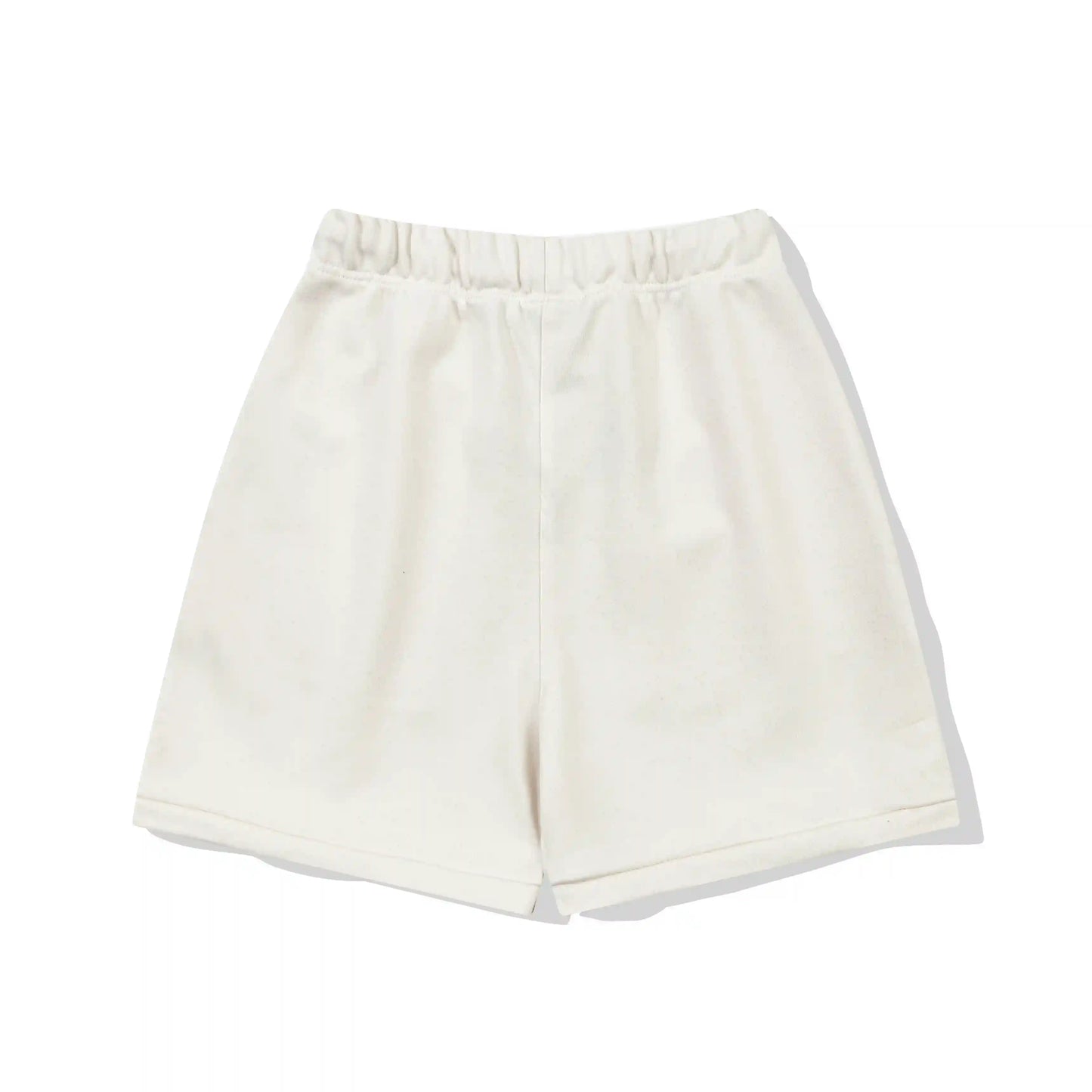 Fear of God Essentials Cloud Dance fleece shorts relaxed fit side view