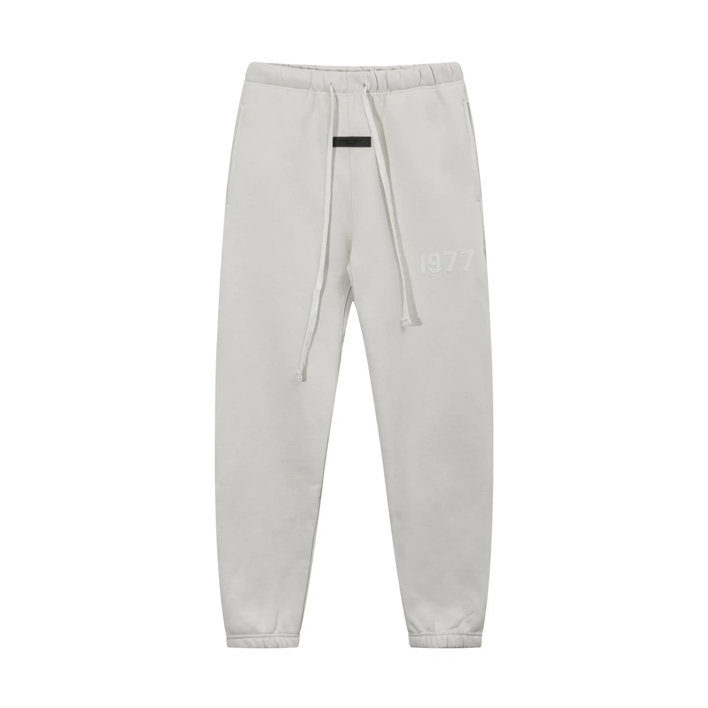 Back view of Essentials eggshell everyday fleece tracksuit set by Fear Of God