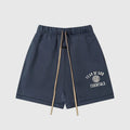 Fear of God Essentials blue fleece shorts with tonal branding and relaxed silhouette