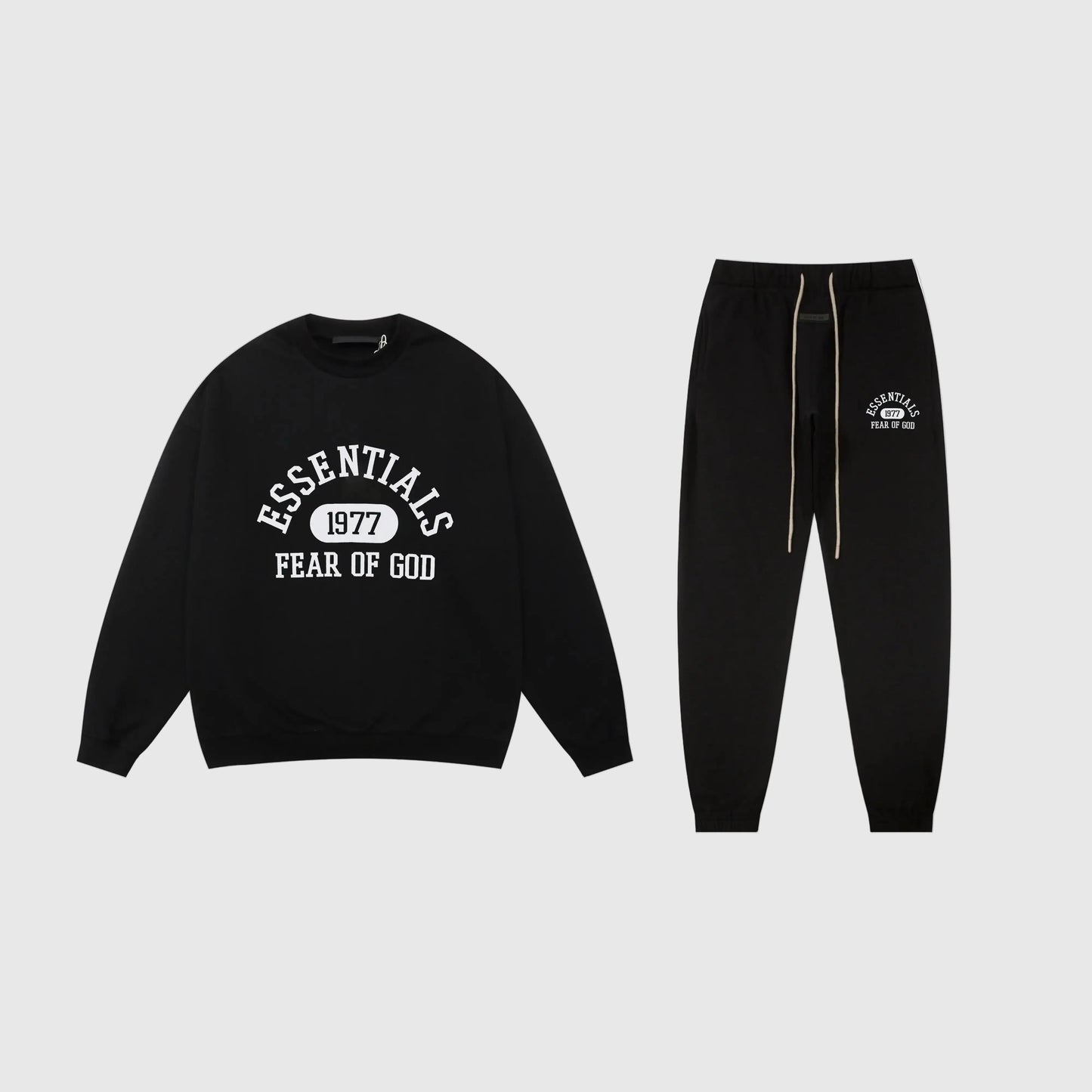 Essentials black core comfort fleece tracksuit set with relaxed fit by Fear Of God