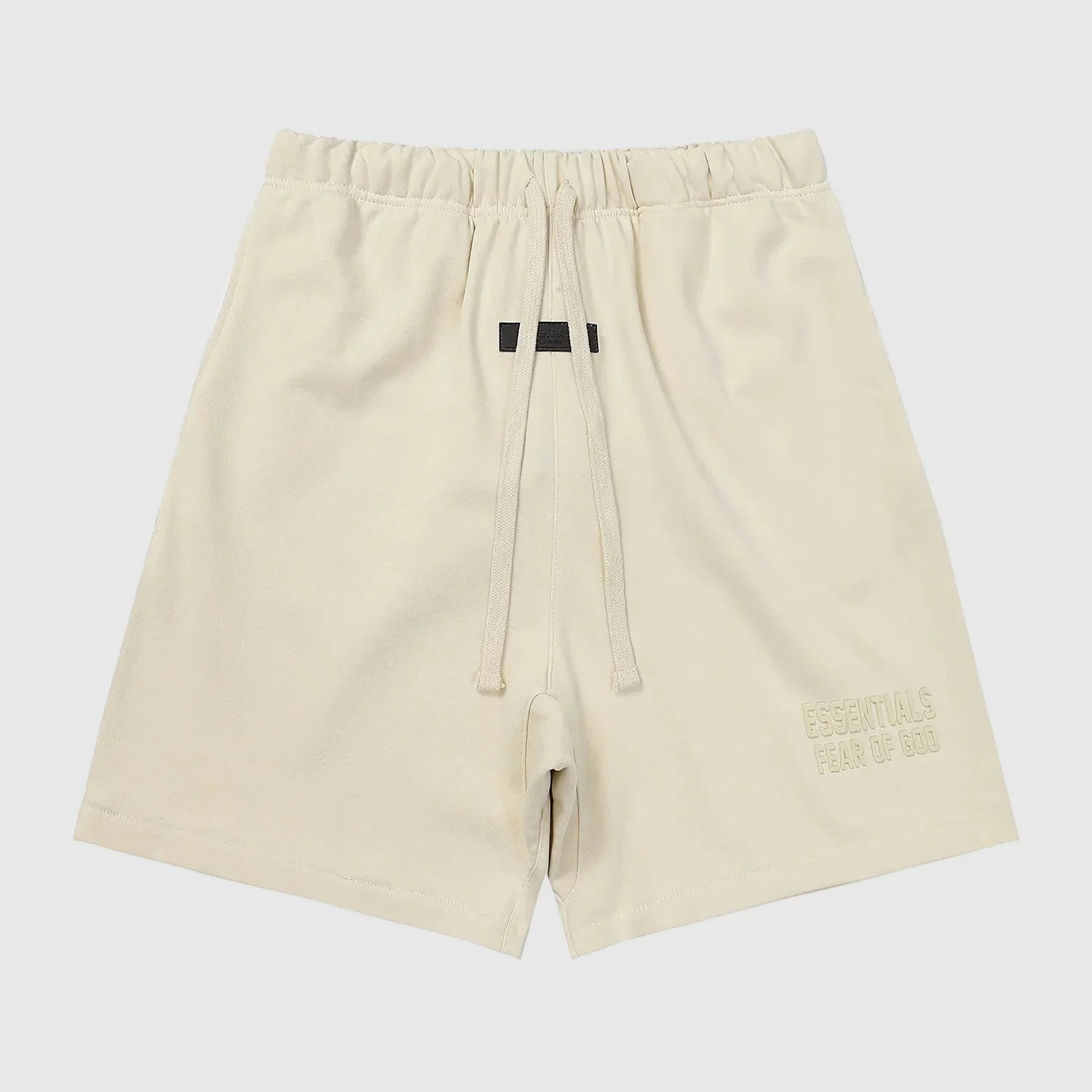 Fear of God Essentials white fleece shorts in cloud dance color with tonal branding and relaxed fit