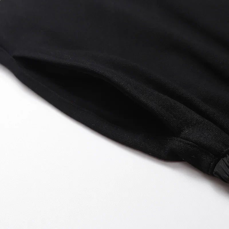 Fear of God Essentials black fleece shorts with tonal branding and modern relaxed fit