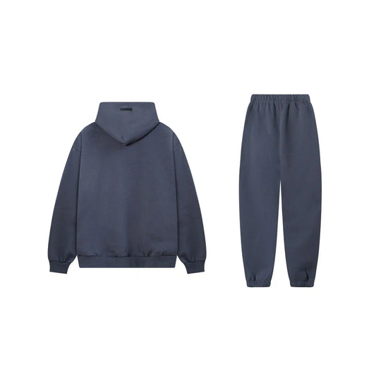 Essentials tracksuit blue full set angled view relaxed fit