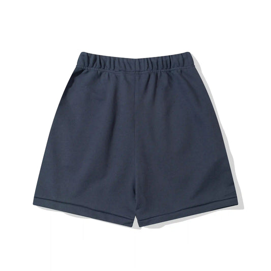 Fear of God Essentials blue fleece shorts with tonal branding and relaxed silhouette
