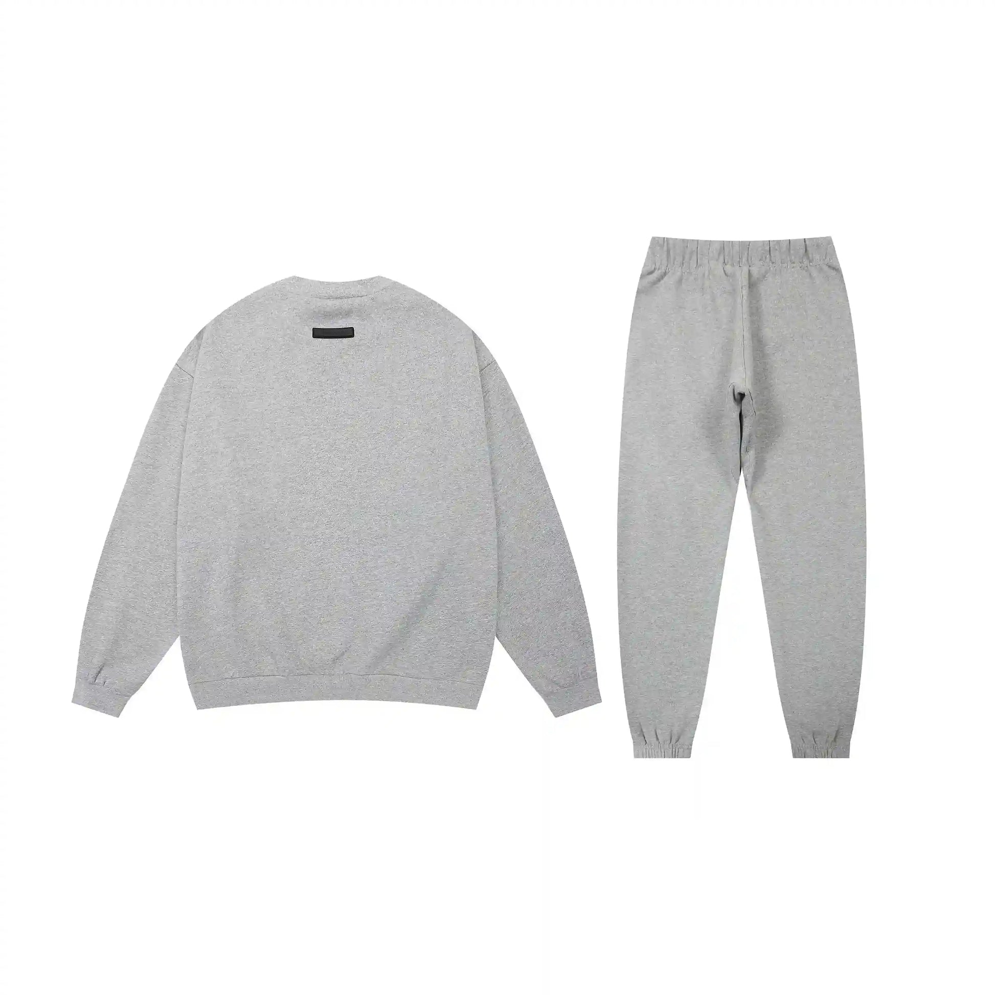 Essentials tracksuit dark heather oatmeal angled view relaxed fit crewneck set