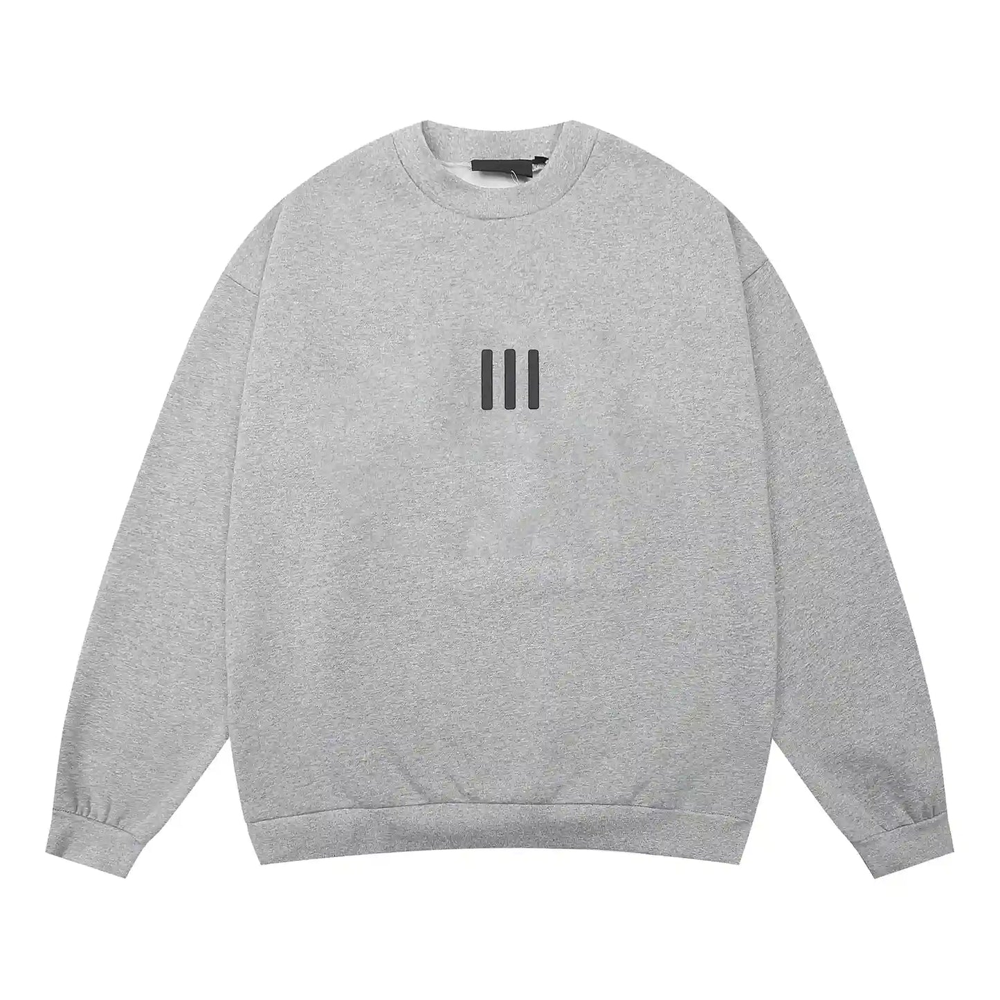 Dark heather oatmeal Essentials crewneck center front rubberized black bar branding detail