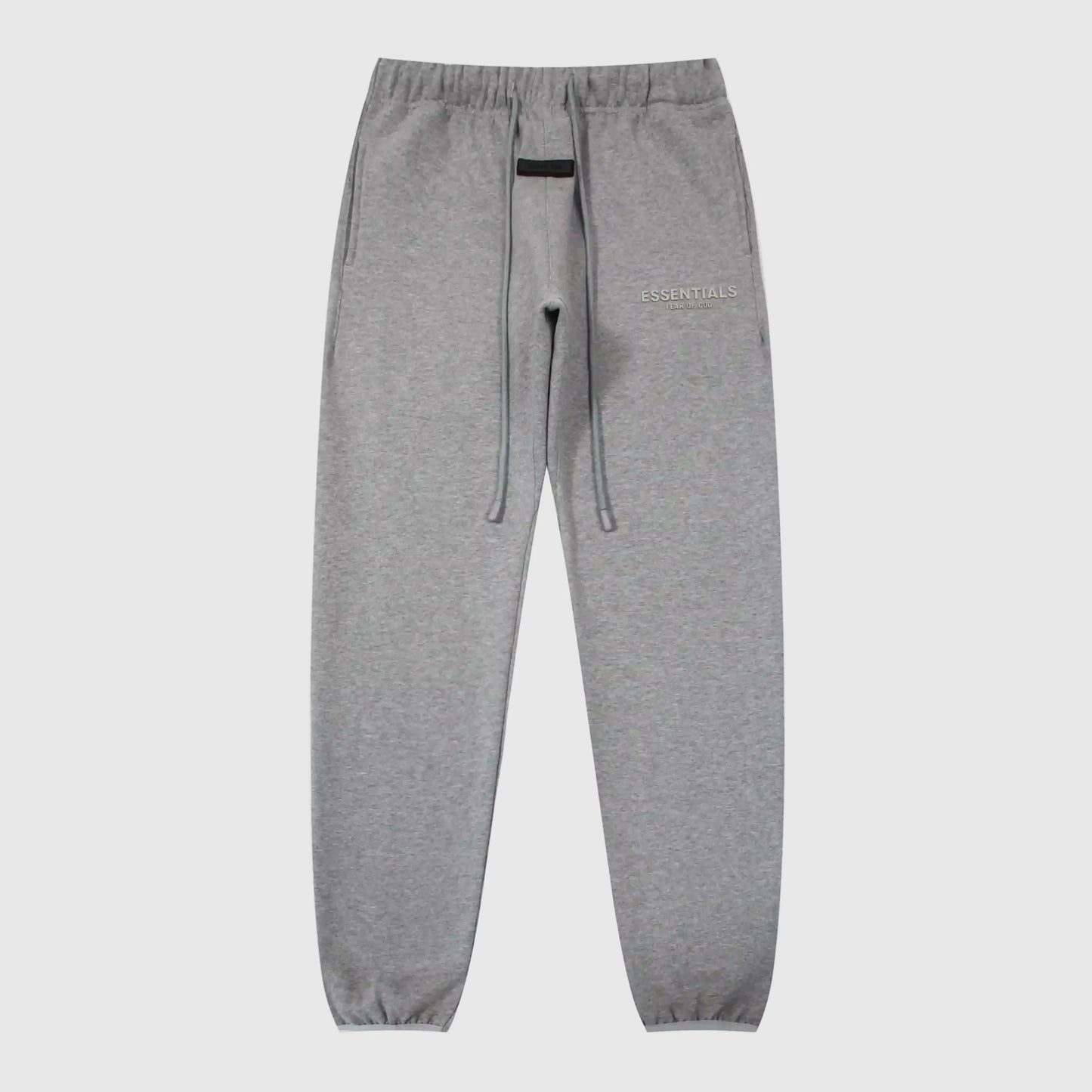 Essentials dark heather oatmeal core fleece sweatpants front view by Fear Of God