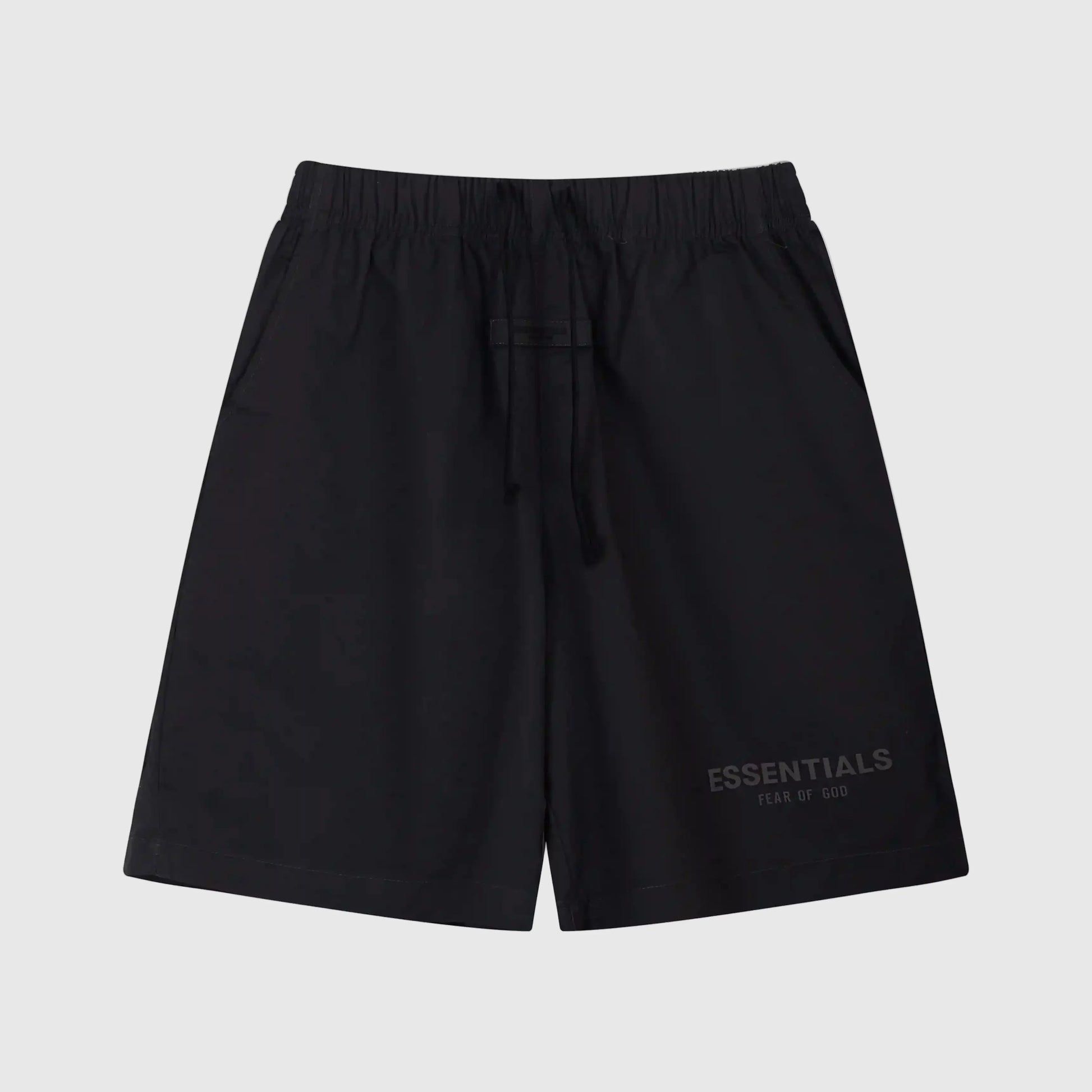 Fear of God Essentials black fleece shorts with tonal logo and relaxed streetwear fit