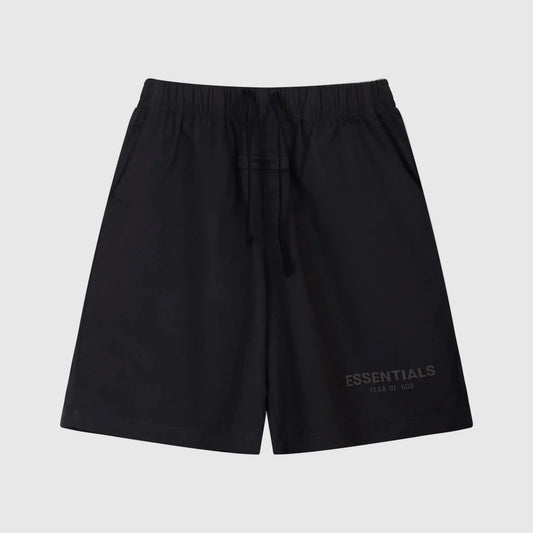 Fear of God Essentials black fleece shorts with tonal logo and relaxed streetwear fit