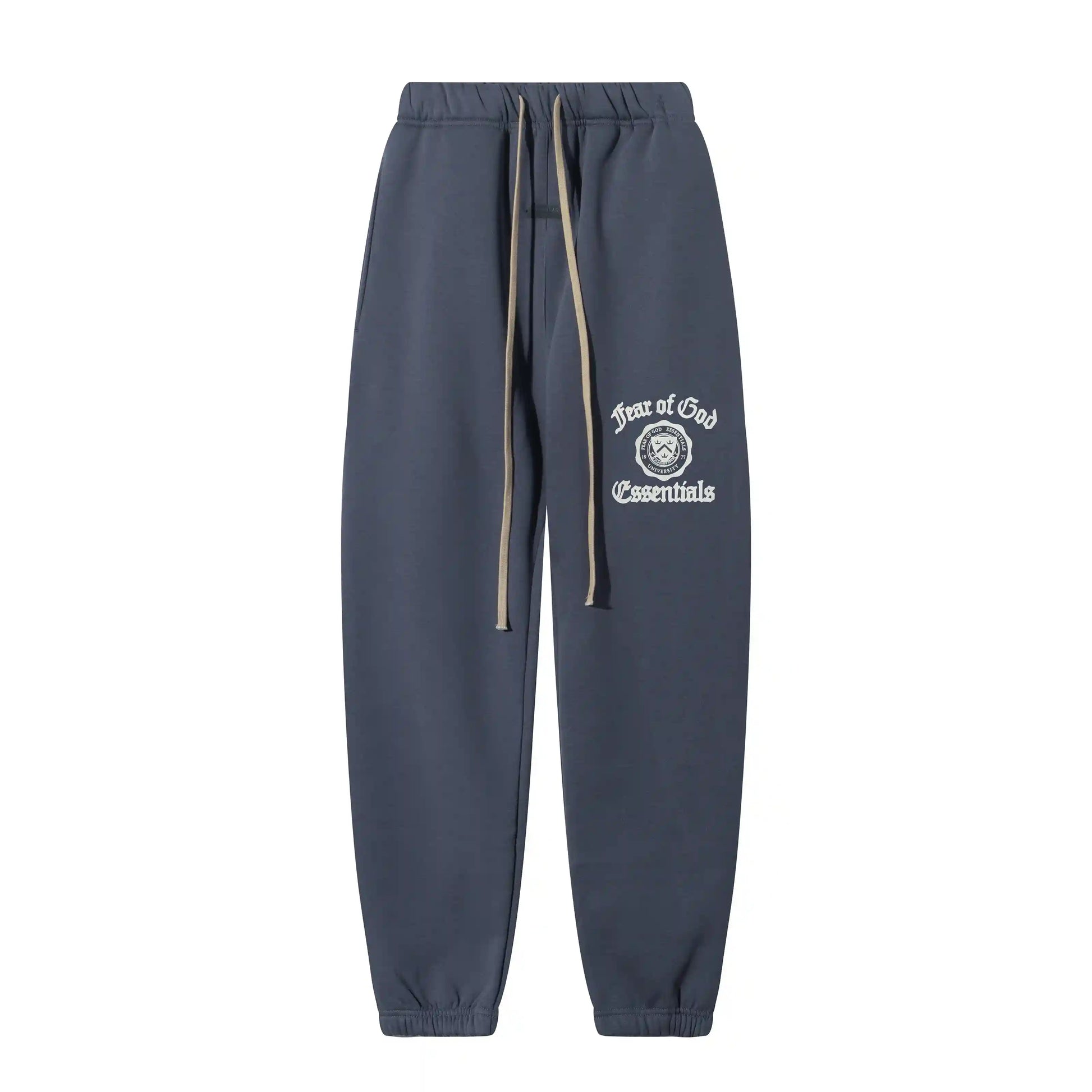 Blue Essentials joggers soft-touch rubberized logo on leg close-up