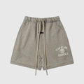 Fear of God Essentials Sandrift light beige fleece shorts with tonal branding and drawcords