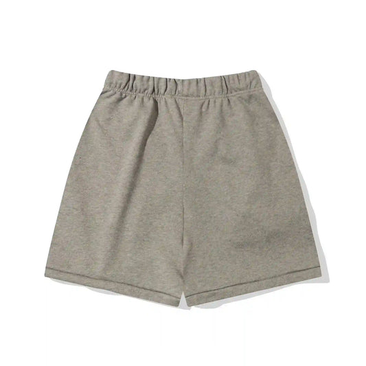 Fear of God Essentials Sandrift light beige fleece shorts with tonal branding and drawcords