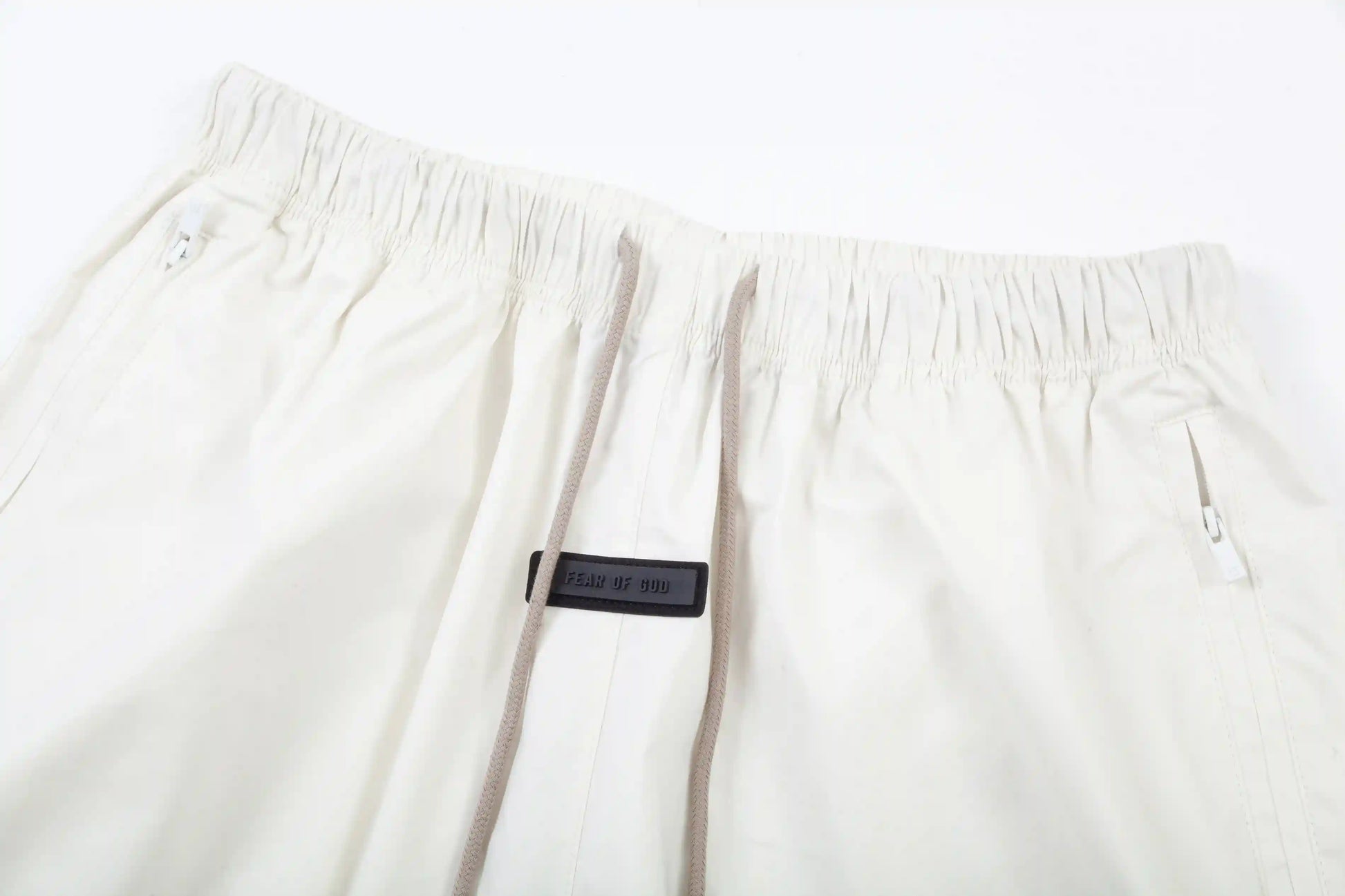 Essentials coordinated eggshell sweatpants set by Fear Of God