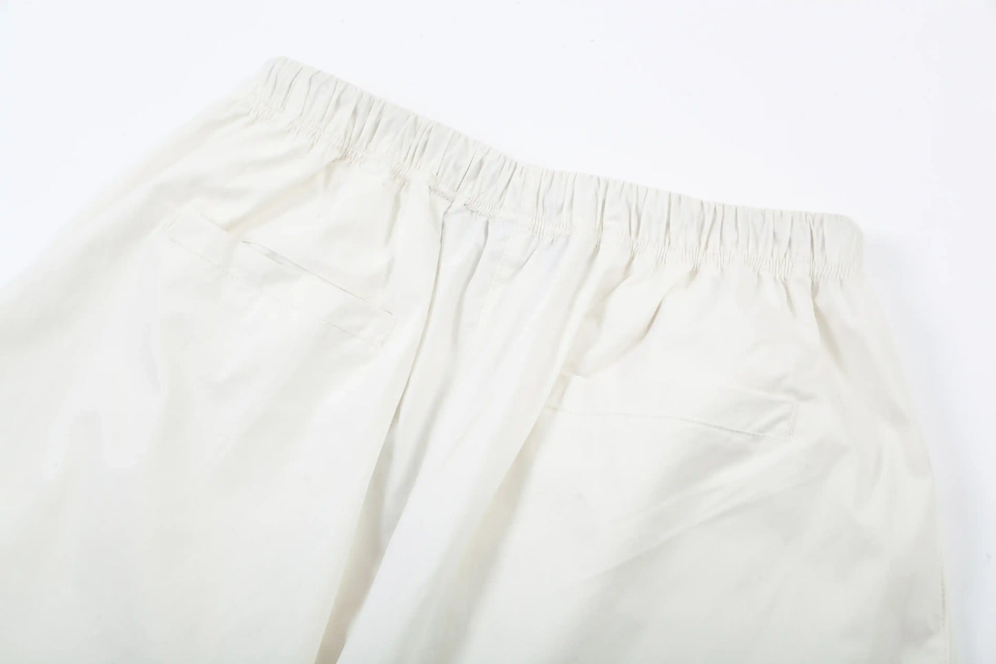 Ribbed ankle cuffs and side pocket detail on sweatpants by Fear Of God