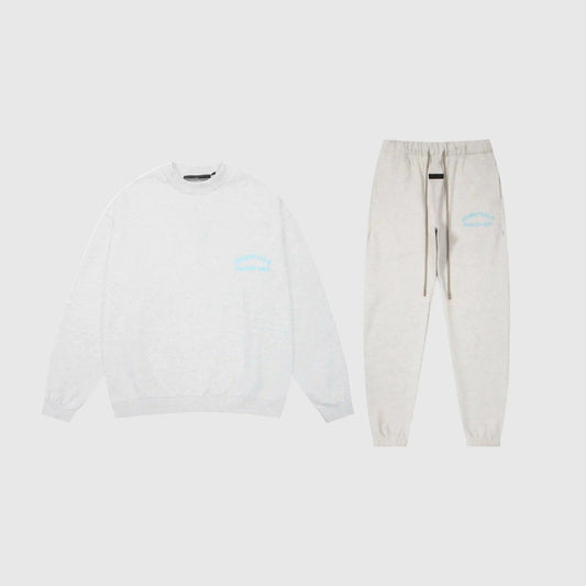 Fear of God Essentials eggshell tracksuit front view hoodie and joggers