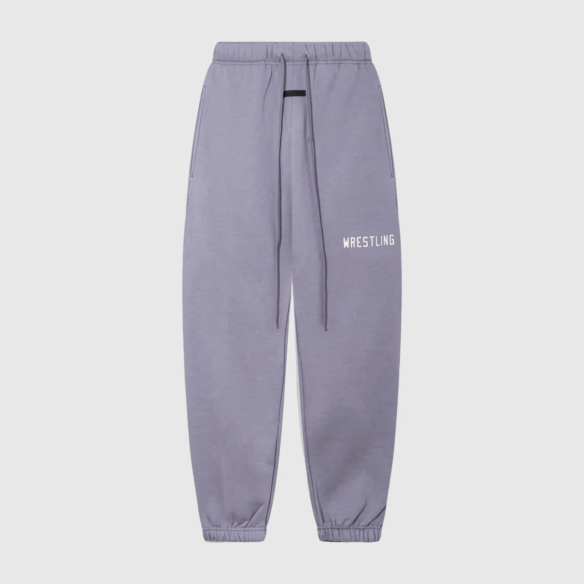 Essentials pastel purple core fleece sweatpants front view by Fear Of God