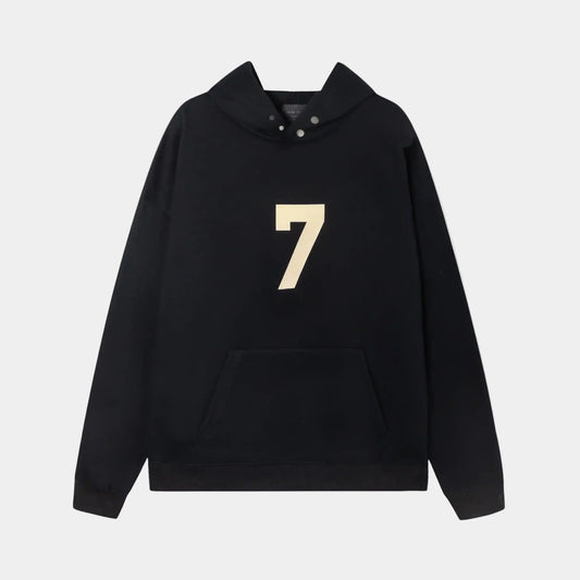Fear of God Essentials black hoodie front view with rubberized front bar branding