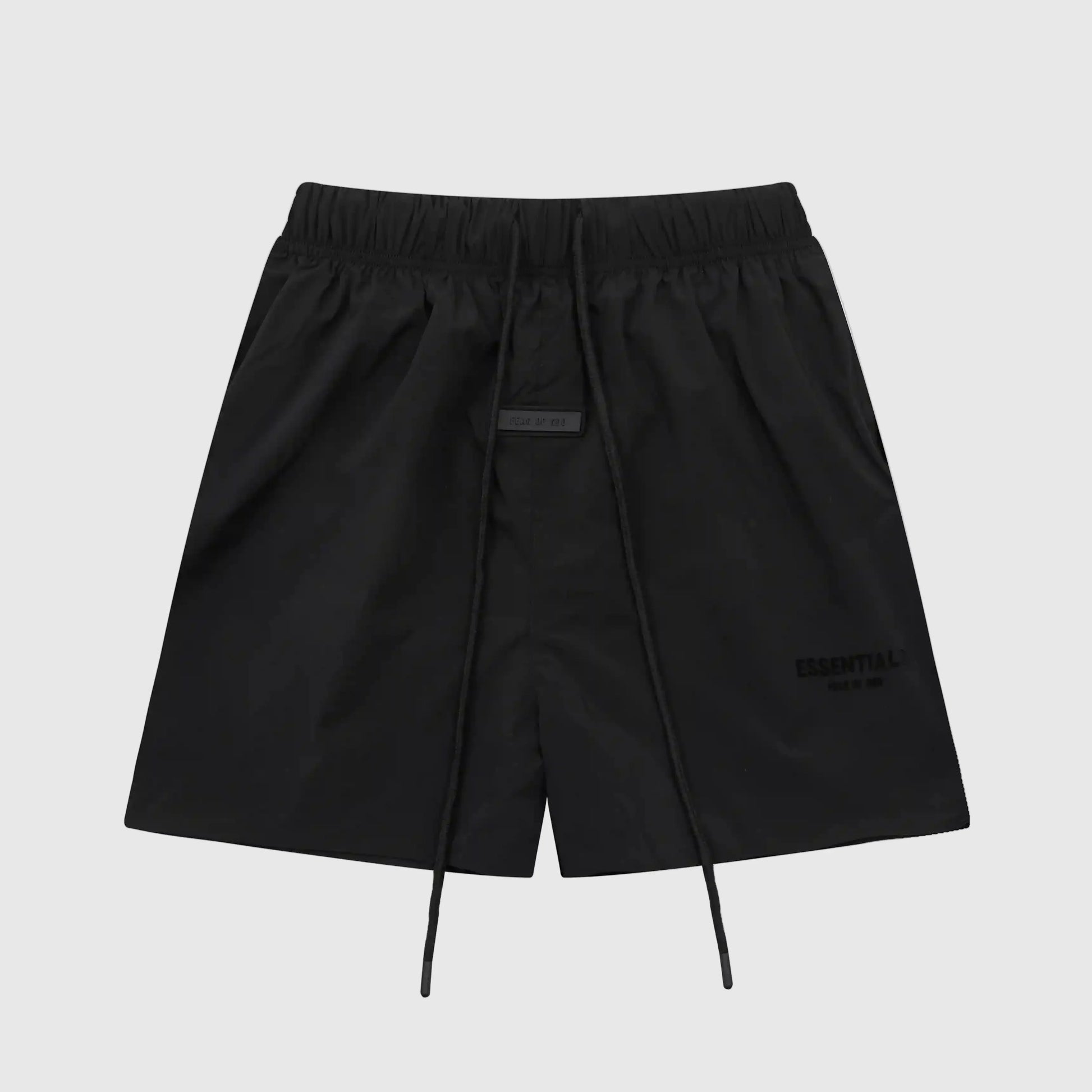 Fear of God Essentials black fleece shorts with tonal logo and long drawstrings