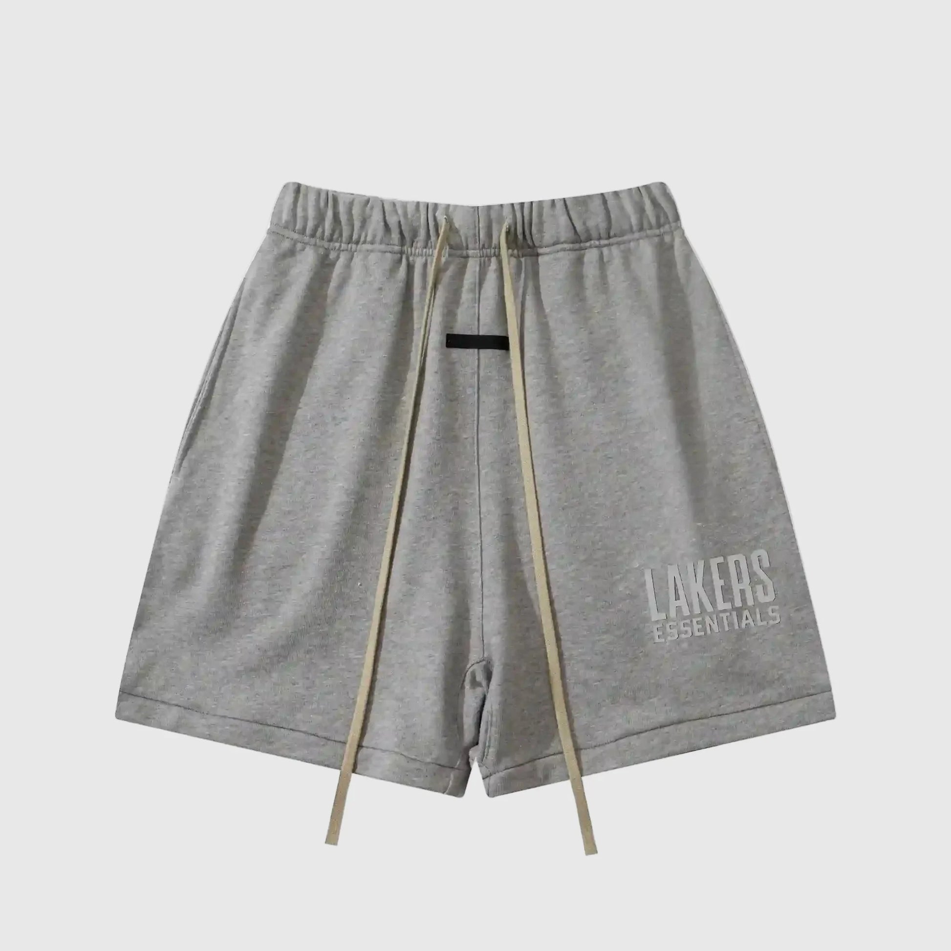 Fear of God Essentials light heather oatmeal fleece shorts with relaxed fit and tonal branding