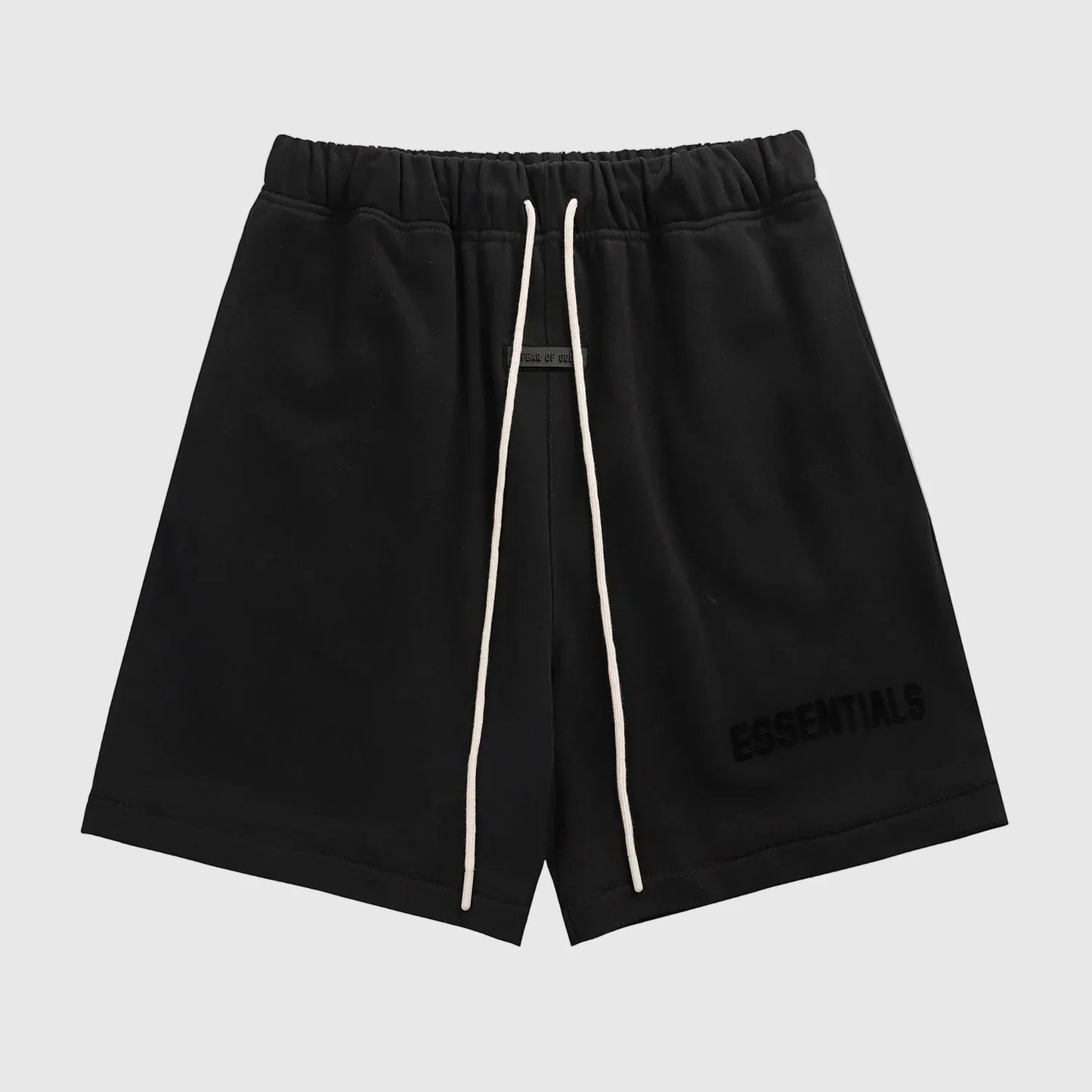 Fear of God Essentials black fleece shorts with tonal logo and oversized fit