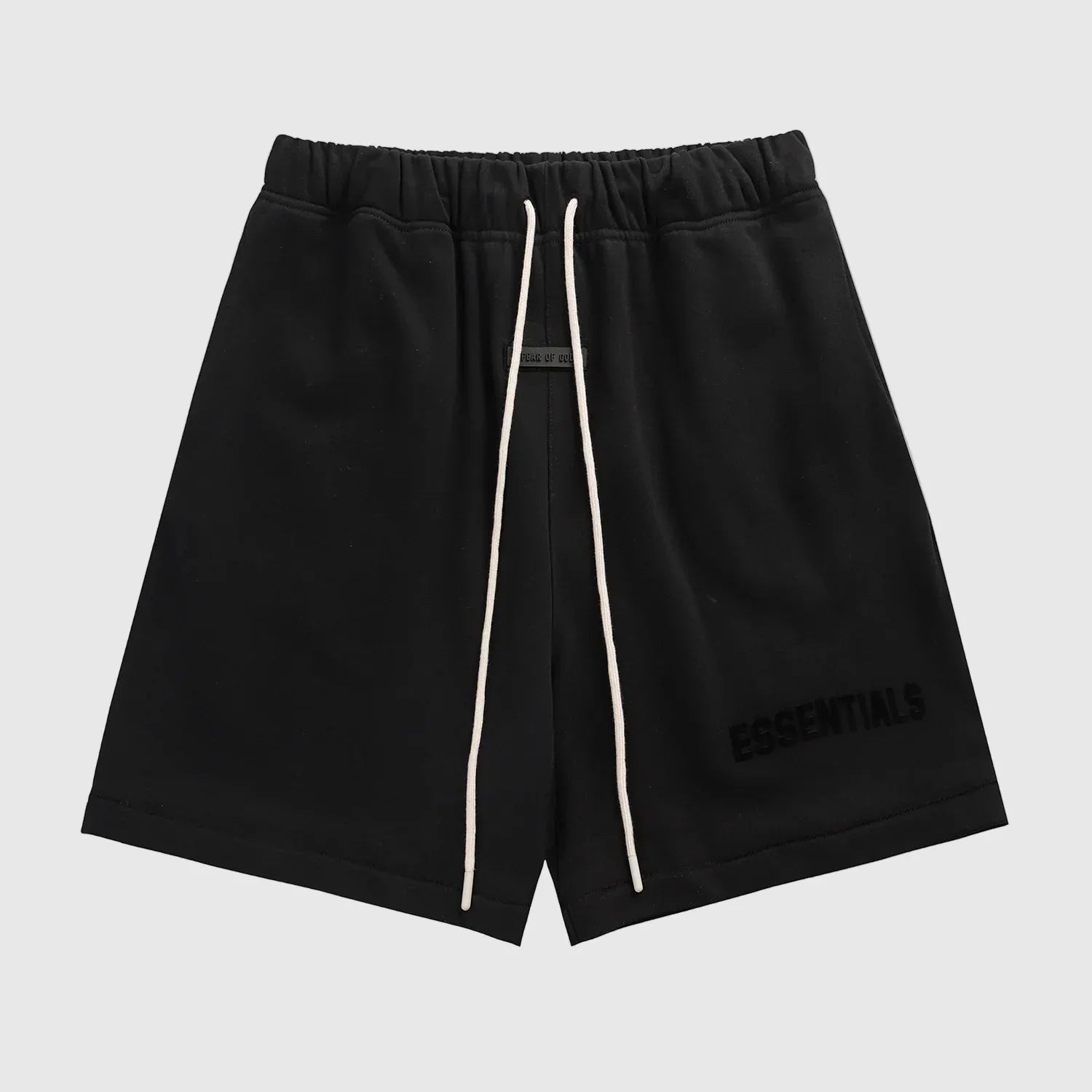 Fear of God Essentials black fleece shorts with tonal logo and oversized fit