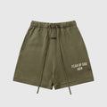 Essentials Hemlock Green Fear of God shorts with tonal logo and heavyweight fleece finish