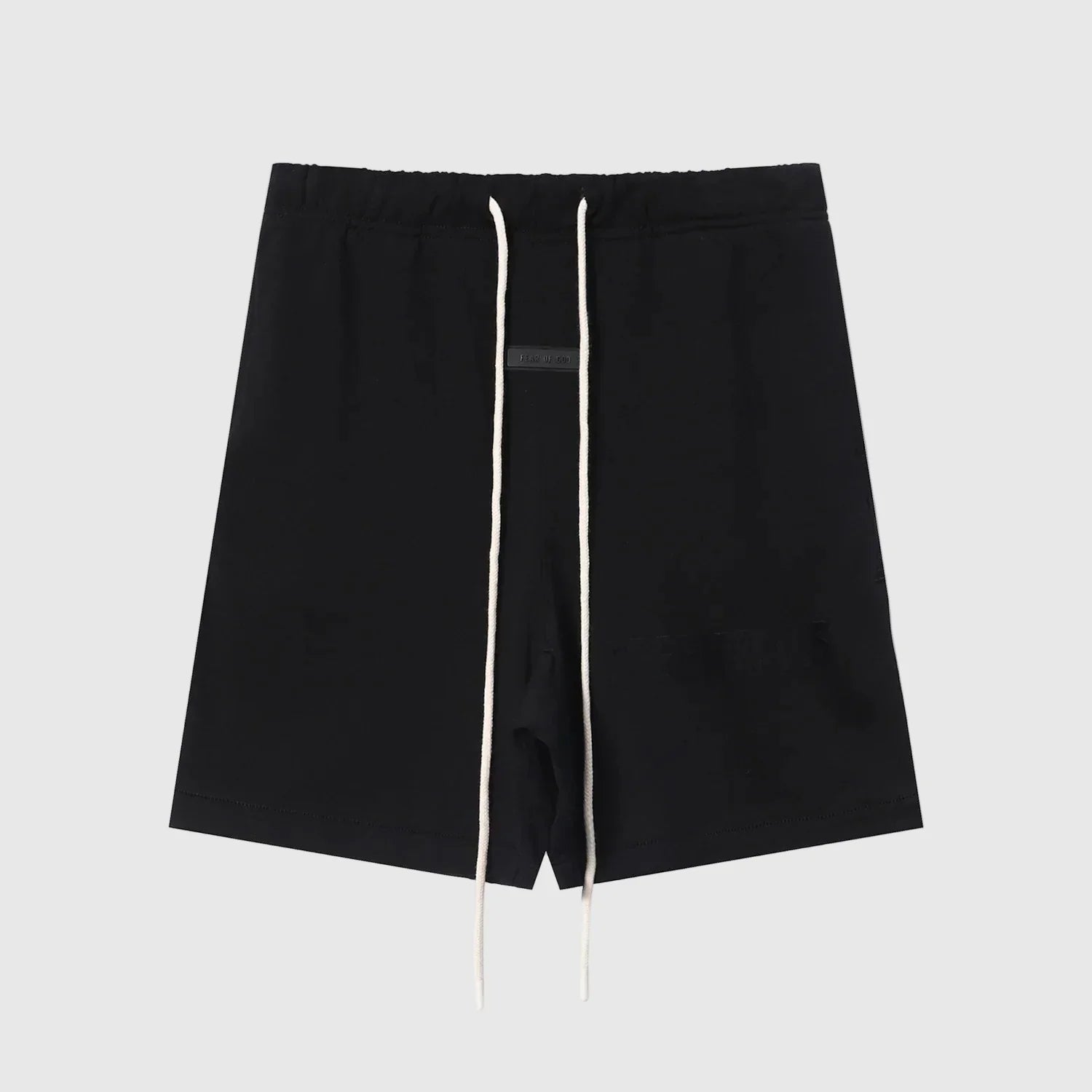 Fear of God Essentials black fleece shorts with tonal logo and relaxed silhouette