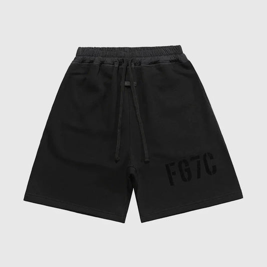 Fear of God Essentials black fleece shorts with tonal branding and relaxed streetwear fit