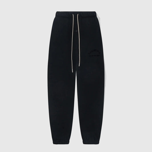 Core fleece fabric detail on black elevated sweatpants by Fear Of God
