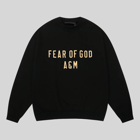Fear of God Essentials black crewneck sweatshirt front view core fleece