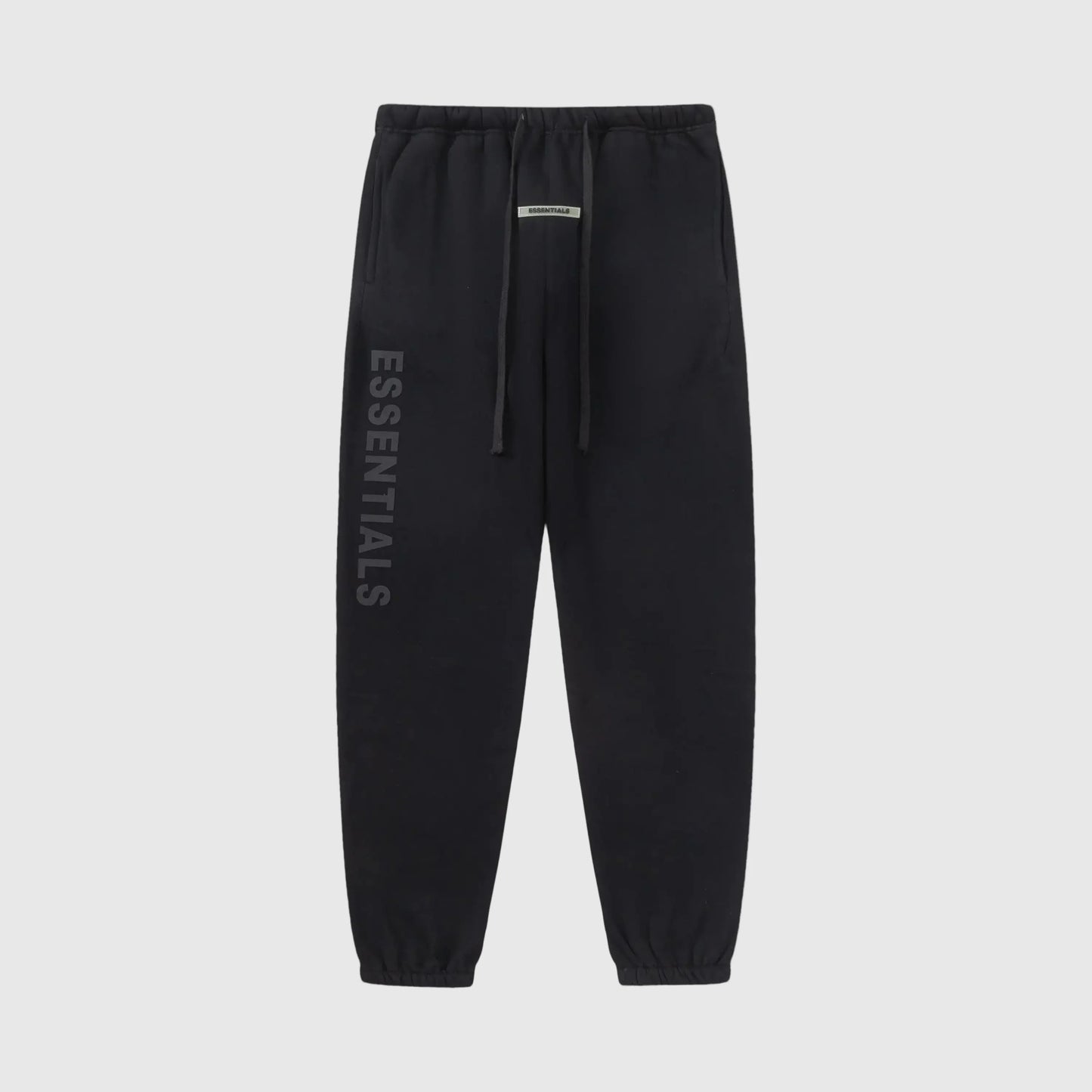 Essentials black relaxed core fleece sweatpants by Fear of God front view