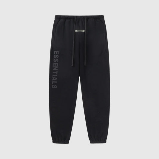 Essentials black relaxed core fleece sweatpants by Fear of God front view