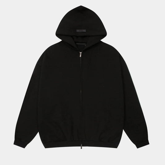 Fear of God Essentials black zip fleece hoodie front view with minimalist branding