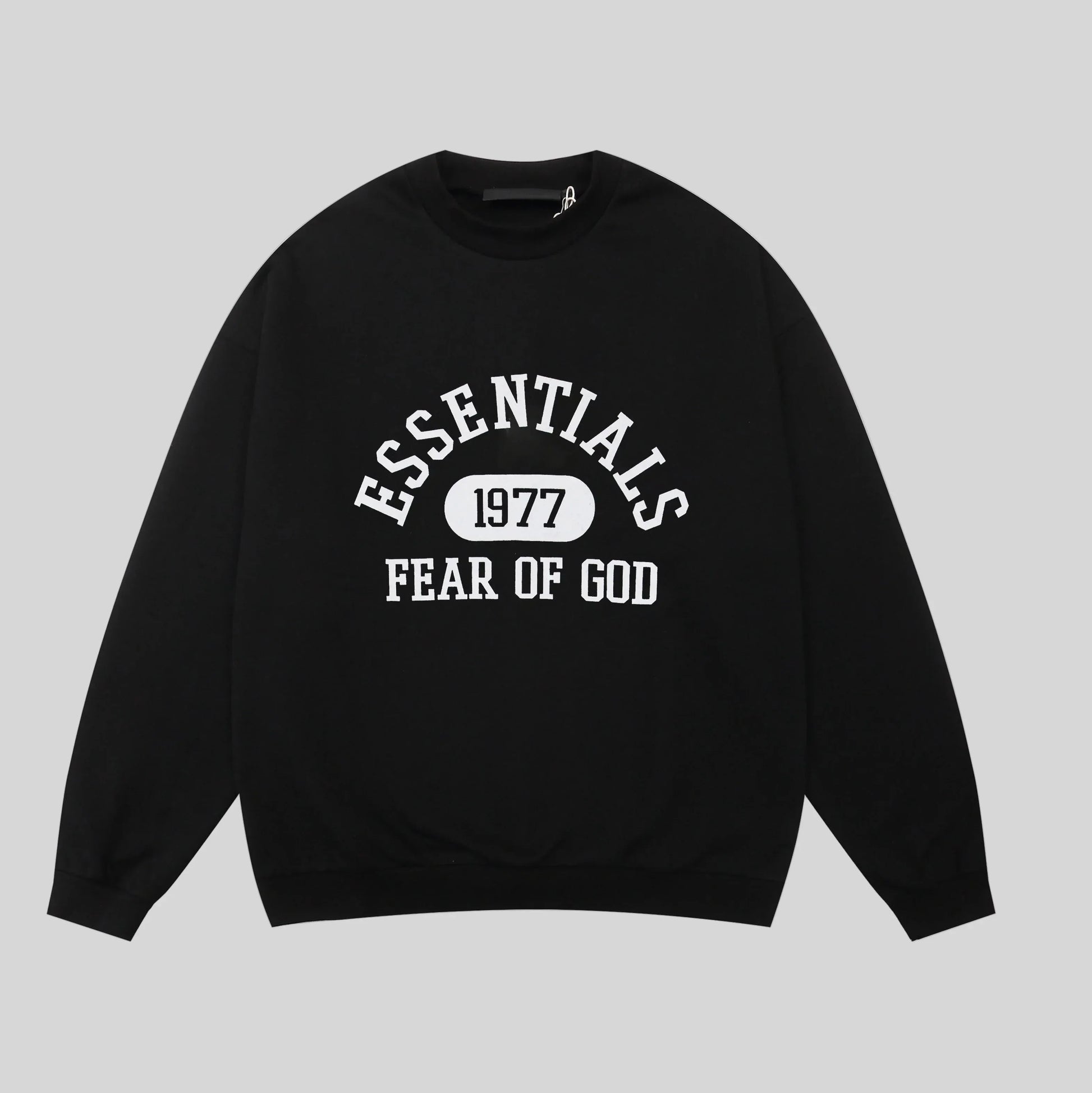 Fear of God Essentials black crewneck sweatshirt front view 380gsm core fleece