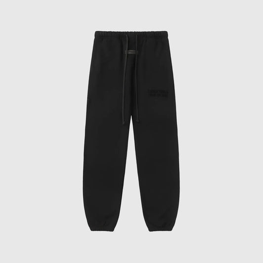 Essentials black relaxed fleece sweatpants by Fear of God front view