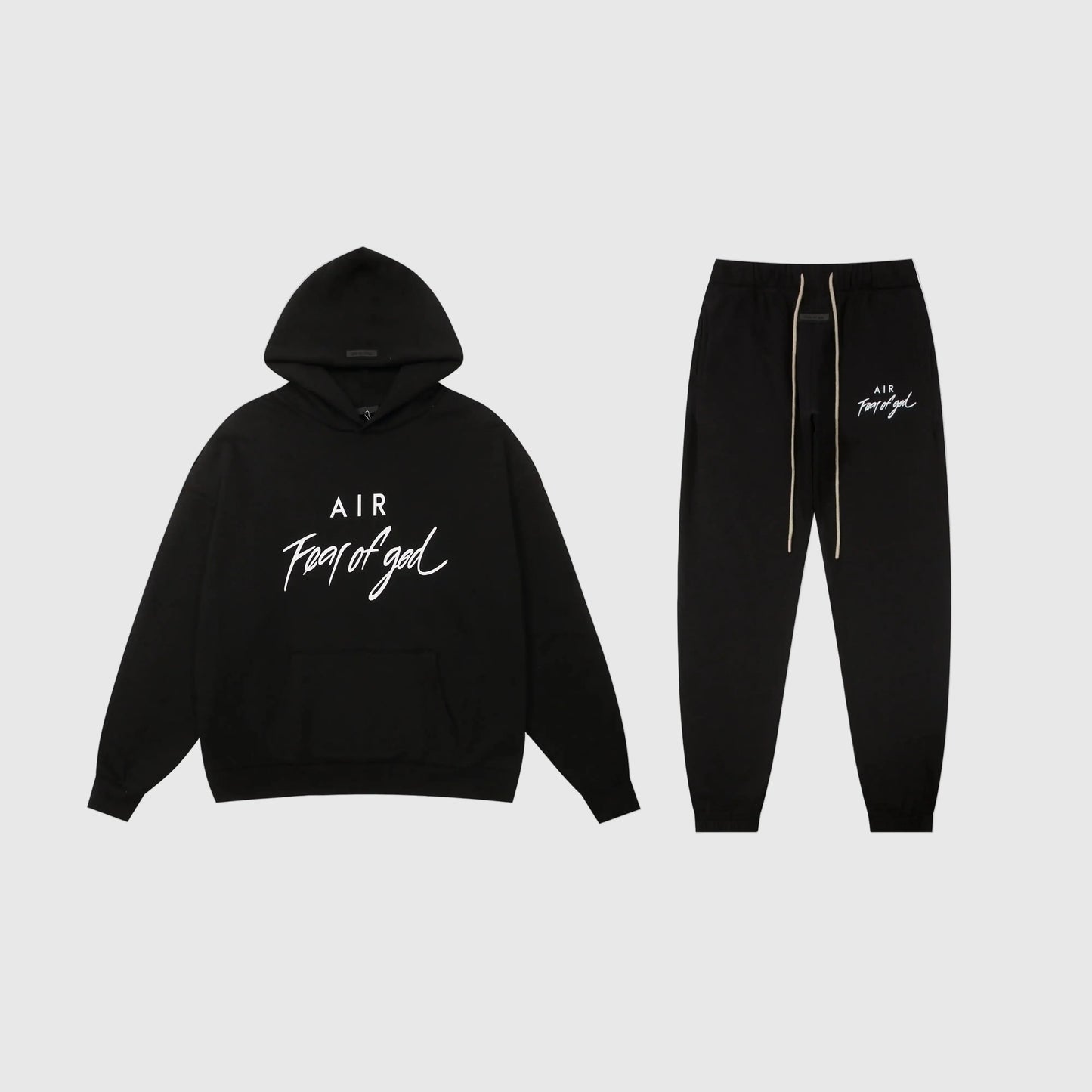 Essentials black relaxed fleece tracksuit set with casual fit by Fear Of God

