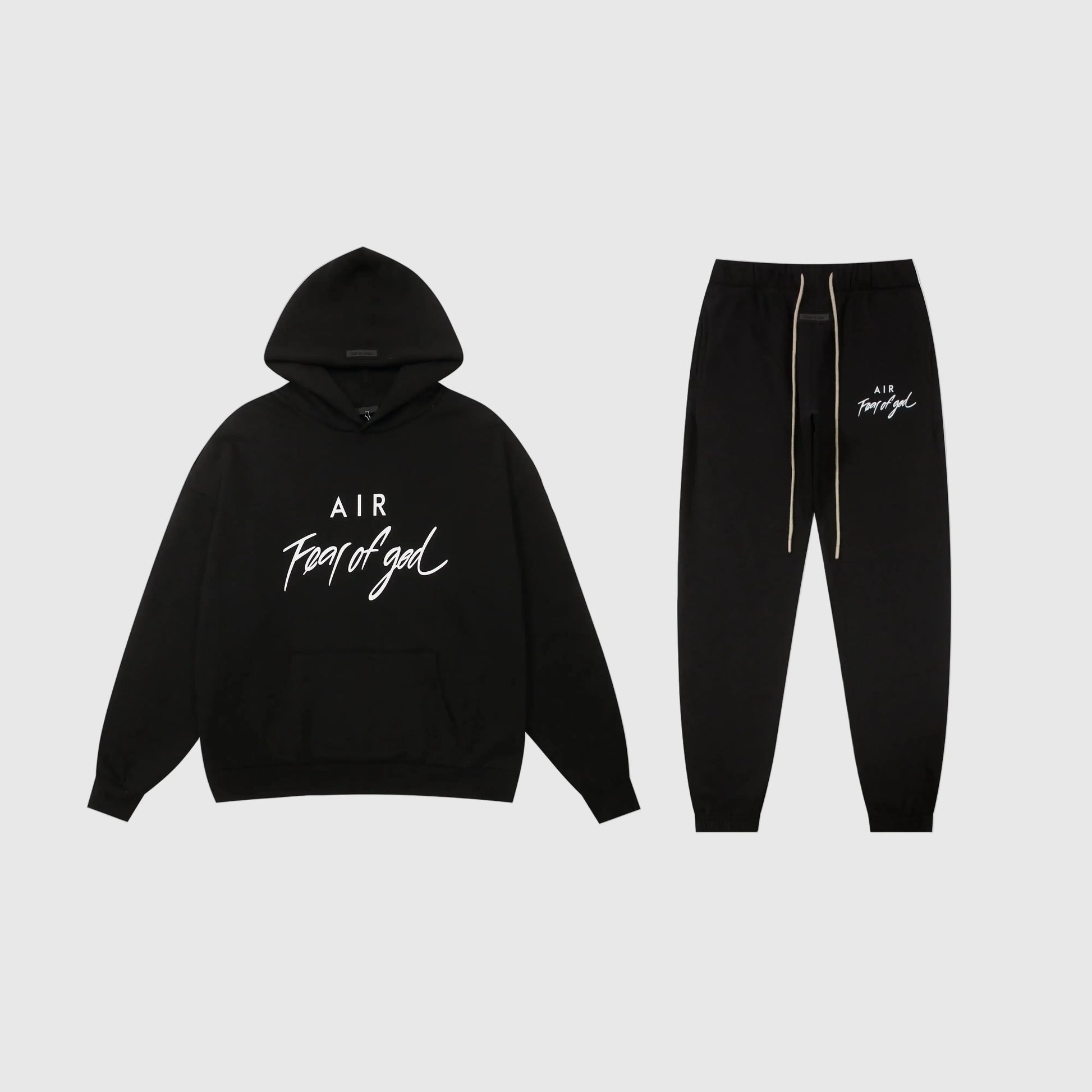 Essentials black relaxed fleece tracksuit set with casual fit by Fear Of God

