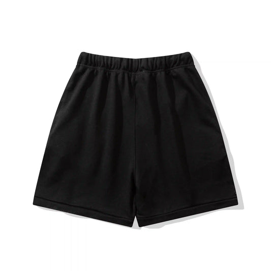 Fear of God Essentials Black fleece shorts relaxed fit side view