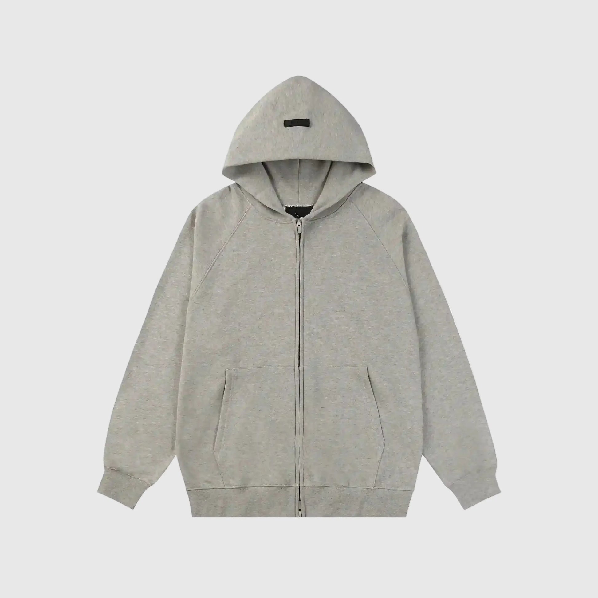 Essentials Light Heather oatmeal zip-up hoodie front view – Fear of God