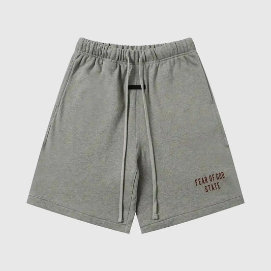 Essentials sand fleece shorts by Fear of God flat lay