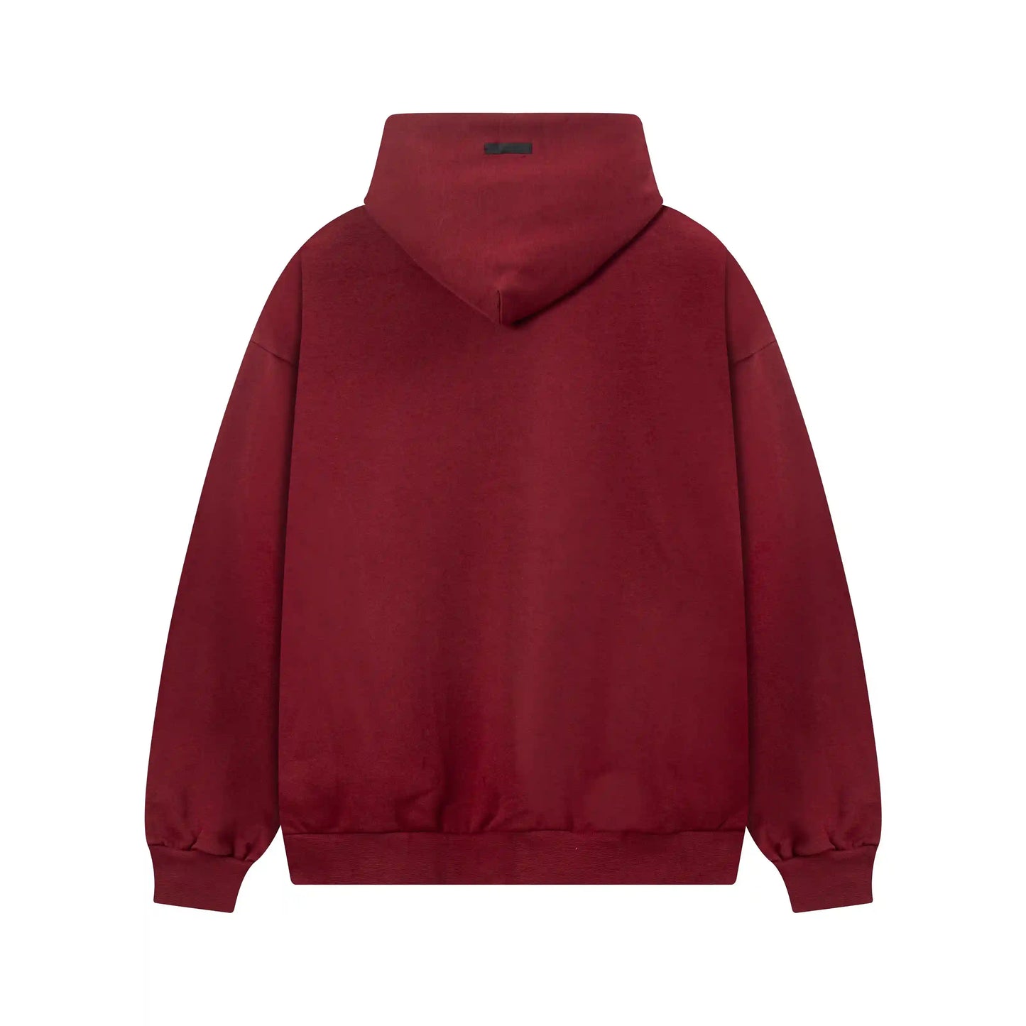 Casual streetwear red tracksuit worn with sneakers by Fear Of God